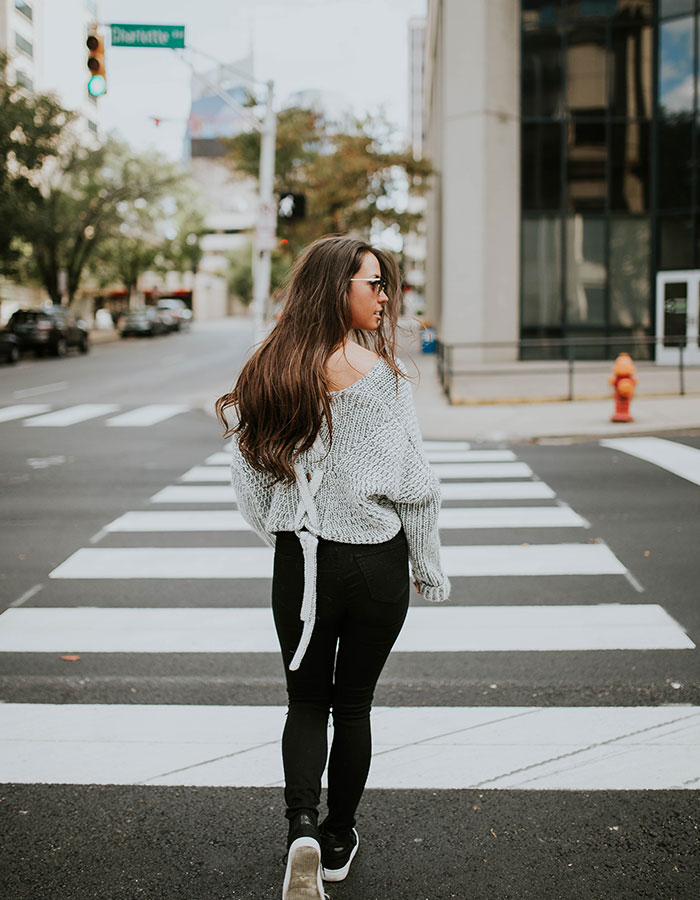 Person walking in a neighbourhood